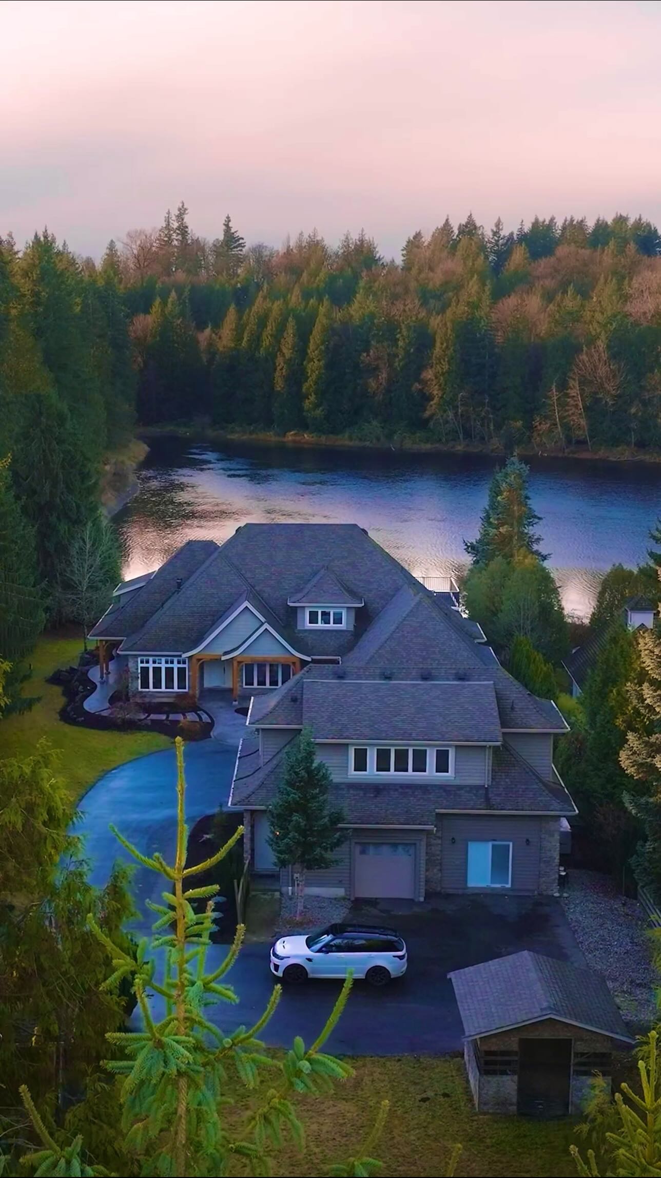 The lakefront estate at 23455 8 Avenue in the four-season property film